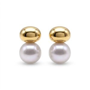 O Brinco com Pérola Grande e Topo Dourado traz sofisticação em cada detalhe, folheado em ouro 18K para valorizar o visual com delicadeza e brilho marcante.
