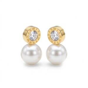 O Brinco com Pérola Grande e Topo Dourado com Algarismos Romanos e com Cravação de Uma Unica Pedra de Zirconia, traz sofisticação em cada detalhe, folheado em ouro 18K para valorizar o visual com delicadeza e brilho marcante. Seja para um look diário ou para um evento especial, esse Brinco se torna sofisticado e vai elevar seu estilo com charme e modernidade.