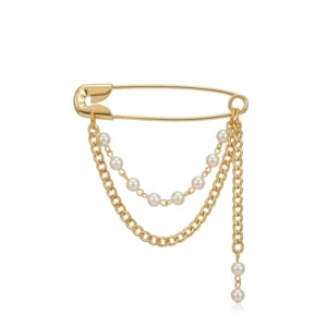 Charmoso e sofisticado, o Broche Alfinete Coreentes com Pérolas, Dourado combina brilho e elegância em um design moderno e delicado. Com destaque elegantes, a peça transmite personalidade e um toque fashion ao visual.